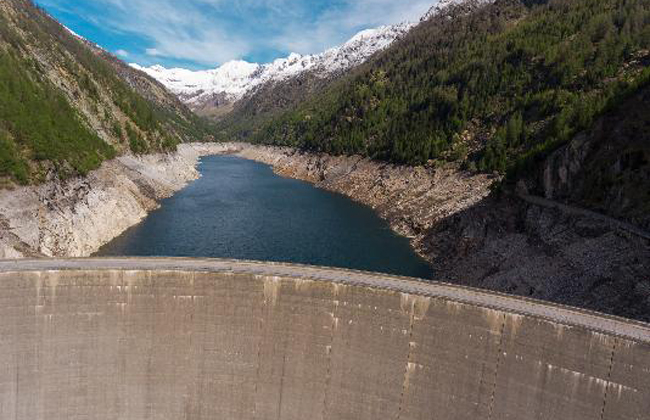 The Lago del Sambuco. It’s located above Fusio in the Lavizzara Valley, a side valley to the Maggia Valley. The reservoir is dammed with a 130-metre high arch dam and has a depth of 110 metres at its deepest point